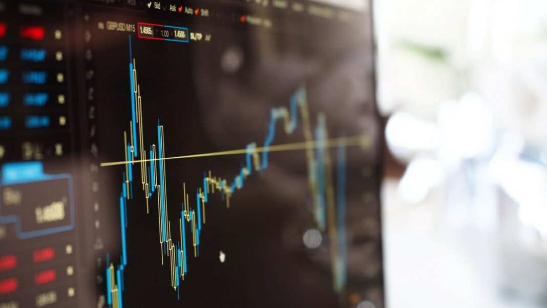 trading at home represented by a close-up photo of a computer monitor showing a trading chart