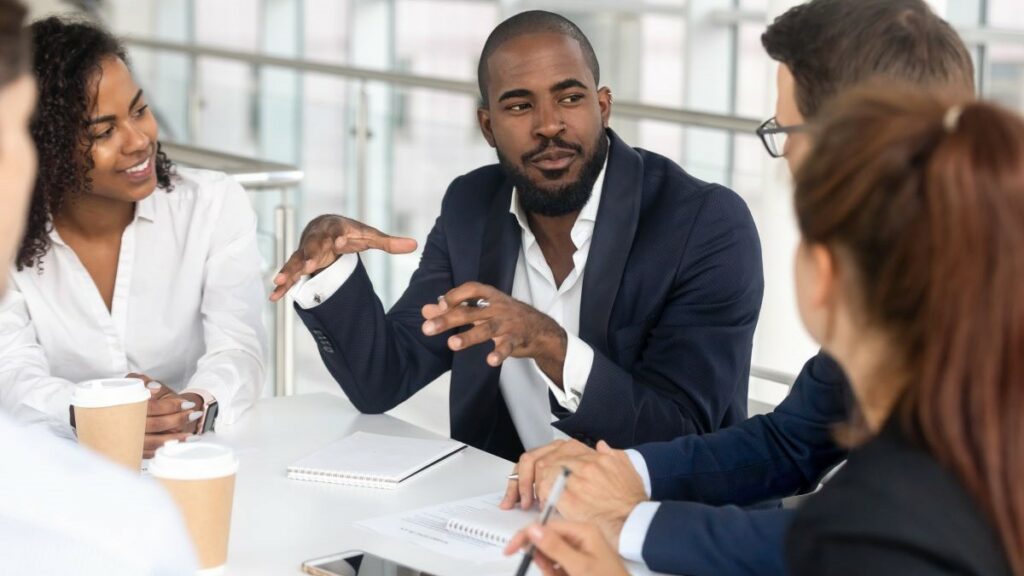 better workplace represented by millennial workers gathered for a corporate training in a modern office setting